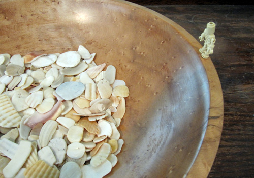 Burl wooden bowl with shells